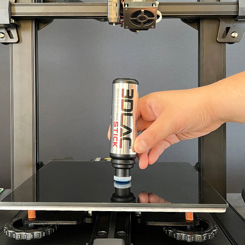 Applying the 3DLAC Stick Water glue stick to the 3D printer bed